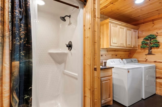 170 Driftcast Rd, Broken Bow, OK 74728 - laundry area featuring independent washer and dryer, wooden walls, cabinet space, and wood ceiling