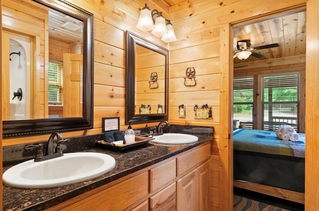 170 Driftcast Rd, Broken Bow, OK 74728 - ensuite bathroom with wooden walls, double vanity, and ceiling fan