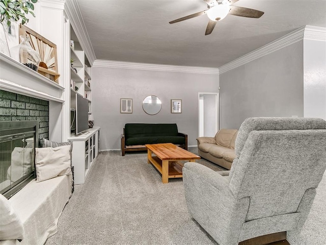 16716 Valley Crst, Edmond, OK 73012 - living room with crown molding, ceiling fan, light colored carpet, a brick fireplace, and baseboards