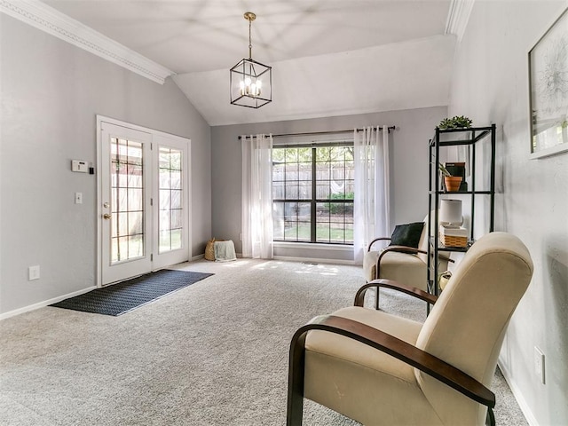 16716 Valley Crst, Edmond, OK 73012 - living area with carpet, vaulted ceiling, a chandelier, baseboards, and crown molding