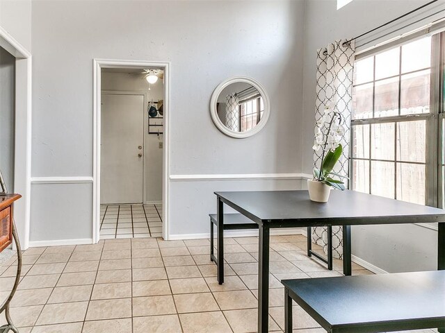 16716 Valley Crst, Edmond, OK 73012 - dining area with light tile patterned floors and baseboards