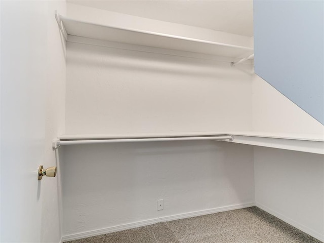 16716 Valley Crst, Edmond, OK 73012 - walk in closet featuring carpet