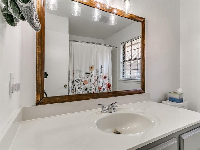 16716 Valley Crst, Edmond, OK 73012 - full bathroom featuring vanity and curtained shower