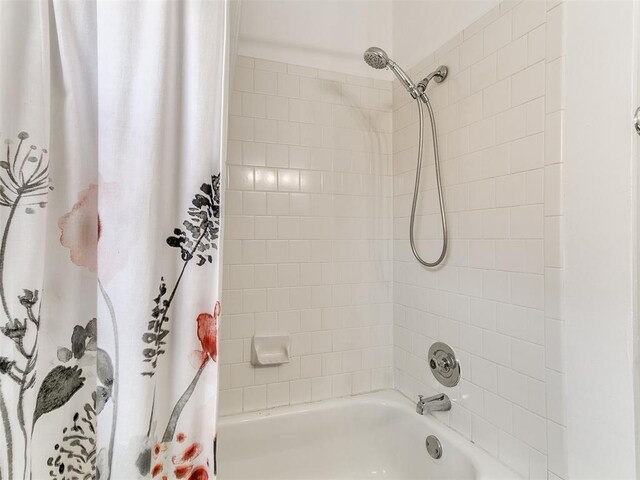 16716 Valley Crst, Edmond, OK 73012 - bathroom with shower / bathtub combination with curtain