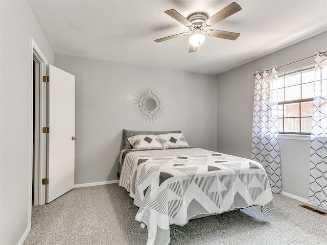 16716 Valley Crst, Edmond, OK 73012 - bedroom with carpet, ceiling fan, and baseboards