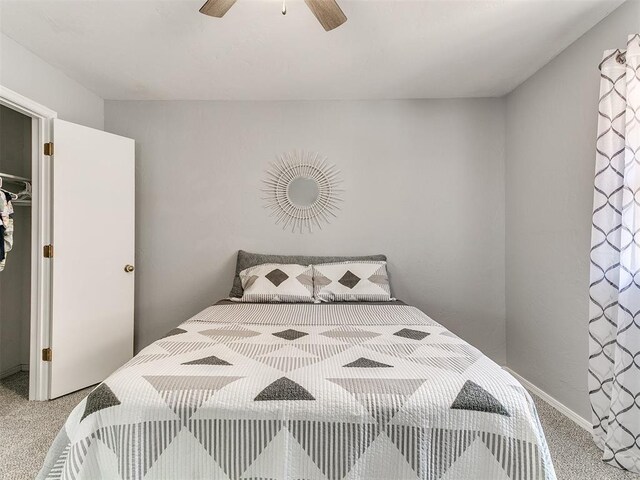16716 Valley Crst, Edmond, OK 73012 - carpeted bedroom with ceiling fan