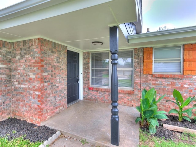 2713 SW 75th St, Oklahoma City, OK 73159 - view of exterior entry with brick siding