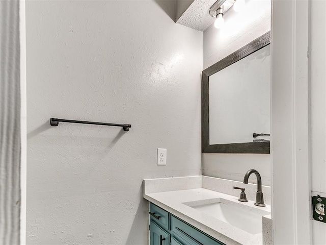 2713 SW 75th St, Oklahoma City, OK 73159 - bathroom with vanity and a textured wall