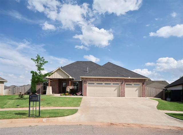 4304 NW 154th Pl, Edmond, OK 73013 - view of front of home with brick siding, a garage, concrete driveway, and a shingled roof