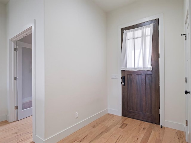 4304 NW 154th Pl, Edmond, OK 73013 - entrance foyer with light wood finished floors and baseboards