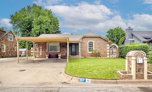 1117 SW 37th St, Oklahoma City, OK 73109 - view of front of house with a front lawn, brick siding, driveway, and a carport