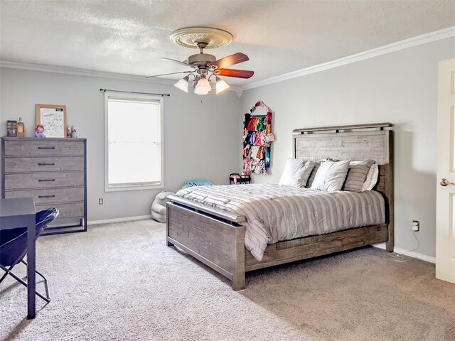 1117 SW 37th St, Oklahoma City, OK 73109 - bedroom with carpet flooring, ornamental molding, baseboards, ceiling fan, and a textured ceiling