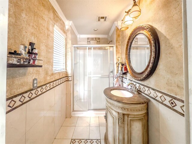 1117 SW 37th St, Oklahoma City, OK 73109 - full bath with crown molding, a stall shower, vanity, and a textured ceiling