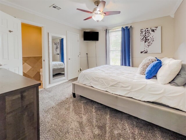 1117 SW 37th St, Oklahoma City, OK 73109 - carpeted bedroom with crown molding and ceiling fan