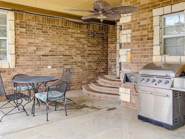 1117 SW 37th St, Oklahoma City, OK 73109 - view of patio with grilling area, a ceiling fan, and outdoor dining space