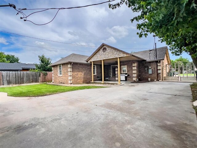 1117 SW 37th St, Oklahoma City, OK 73109 - single story home with brick siding, concrete driveway, and a shingled roof