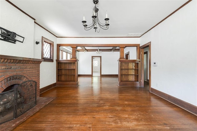 1505 NW 34th St, Oklahoma City, OK 73118 - unfurnished living room with hardwood / wood-style floors, a chandelier, crown molding, baseboards, and a fireplace