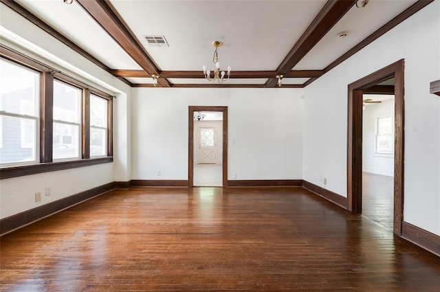 1505 NW 34th St, Oklahoma City, OK 73118 - spare room featuring a chandelier, baseboards, hardwood / wood-style flooring, beamed ceiling, and a smoke detector