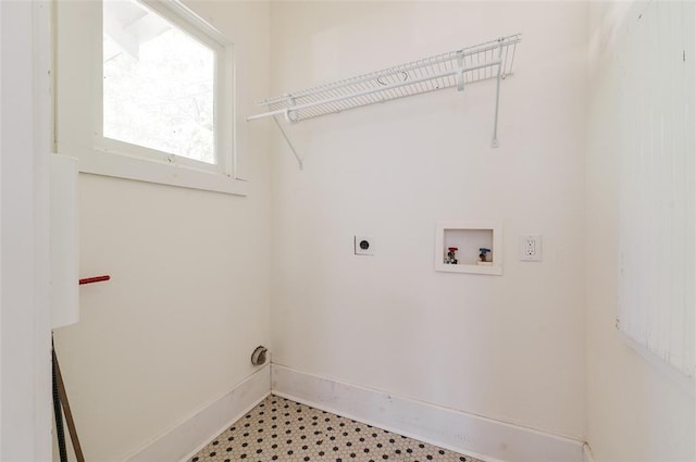 1505 NW 34th St, Oklahoma City, OK 73118 - laundry area with hookup for a washing machine, baseboards, and electric dryer hookup