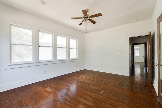 1505 NW 34th St, Oklahoma City, OK 73118 - spare room with baseboards, hardwood / wood-style floors, ceiling fan, and a smoke detector