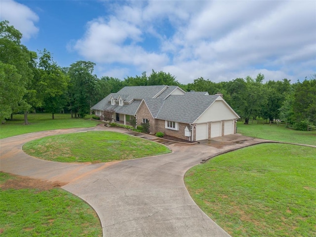 2108 Woodhill Rd, Edmond, OK 73025 - traditional home with driveway, brick siding, a front yard, and an attached garage