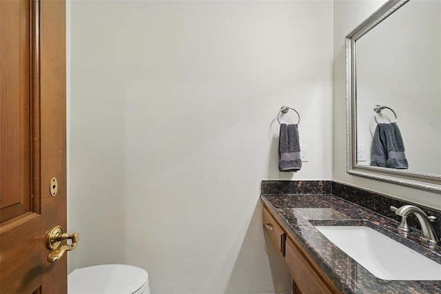 2108 Woodhill Rd, Edmond, OK 73025 - bathroom featuring vanity and toilet