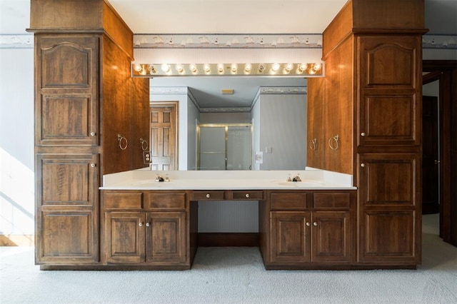 607 Aberdeen Rd, Edmond, OK 73025 - full bath featuring a stall shower, double vanity, and carpet floors