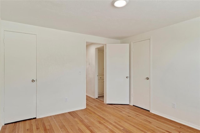 1121 NW 105th St, Oklahoma City, OK 73114 - unfurnished bedroom featuring light wood-style flooring and baseboards