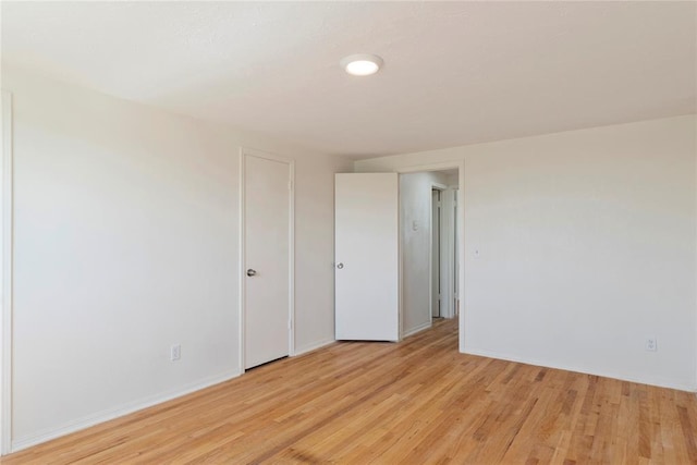 1121 NW 105th St, Oklahoma City, OK 73114 - unfurnished room featuring light wood-style flooring