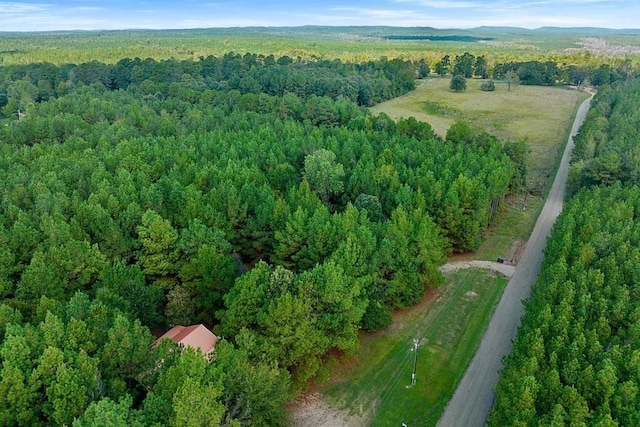 657 Canoe Rd, Broken Bow, OK 74728 - aerial overview of property's location with a heavily wooded area