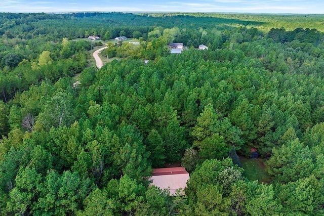 657 Canoe Rd, Broken Bow, OK 74728 - aerial view of property and surrounding area featuring a heavily wooded area