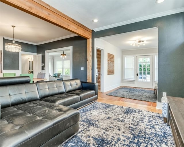 1218 NW 21st St, Oklahoma City, OK 73106 - living room with a chandelier, plenty of natural light, crown molding, baseboards, and recessed lighting