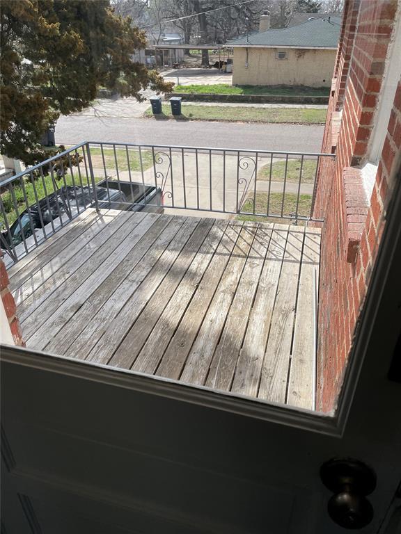 128 W Ridgewood St, Shawnee, OK 74801 - view of wooden deck