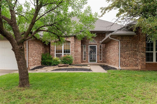 2613 NW 159th St, Edmond, OK 73013 - single story home featuring brick siding, a front lawn, an attached garage, and a shingled roof