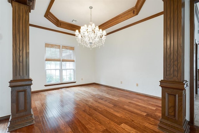 2613 NW 159th St, Edmond, OK 73013 - empty room with a raised ceiling, hardwood / wood-style floors, ornamental molding, a chandelier, and baseboards