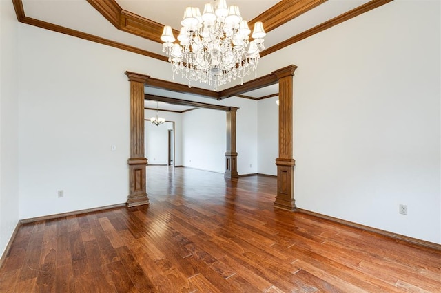 2613 NW 159th St, Edmond, OK 73013 - unfurnished room with a chandelier, wood finished floors, ornamental molding, a tray ceiling, and baseboards