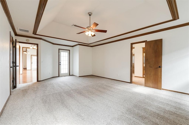 2613 NW 159th St, Edmond, OK 73013 - unfurnished room with a tray ceiling, ornamental molding, ceiling fan, light colored carpet, and baseboards