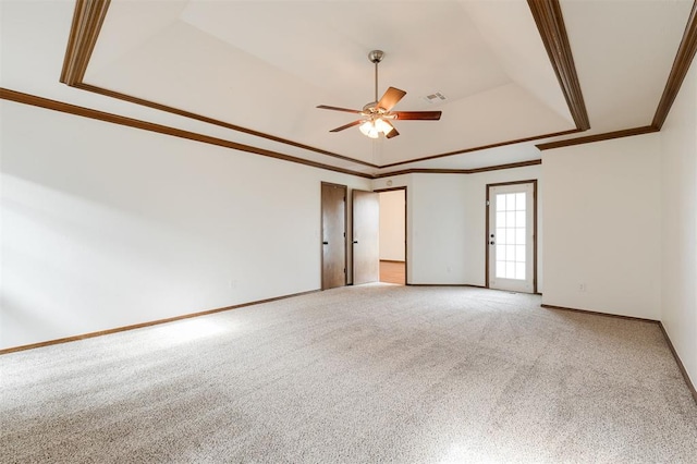 2613 NW 159th St, Edmond, OK 73013 - unfurnished room with a tray ceiling, ceiling fan, light colored carpet, ornamental molding, and baseboards