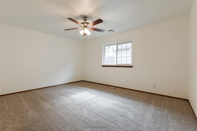 2613 NW 159th St, Edmond, OK 73013 - carpeted spare room featuring a ceiling fan and baseboards