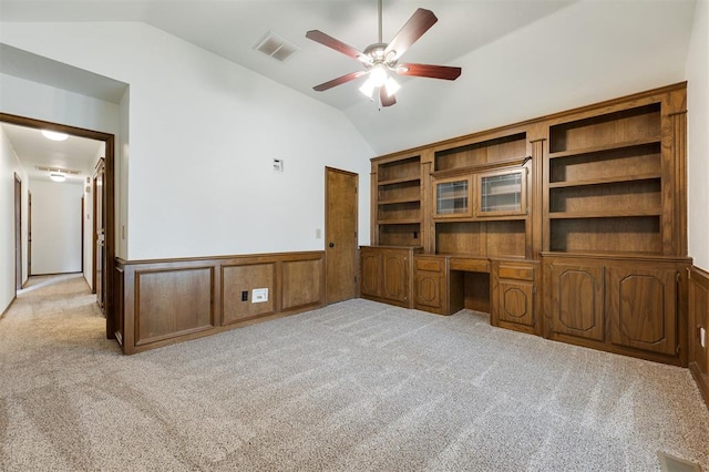 2613 NW 159th St, Edmond, OK 73013 - unfurnished office with vaulted ceiling, a ceiling fan, built in study area, wainscoting, and light colored carpet