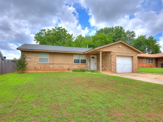 332 Crest Ln, Noble, OK 73068 - single story home featuring brick siding, a garage, and driveway