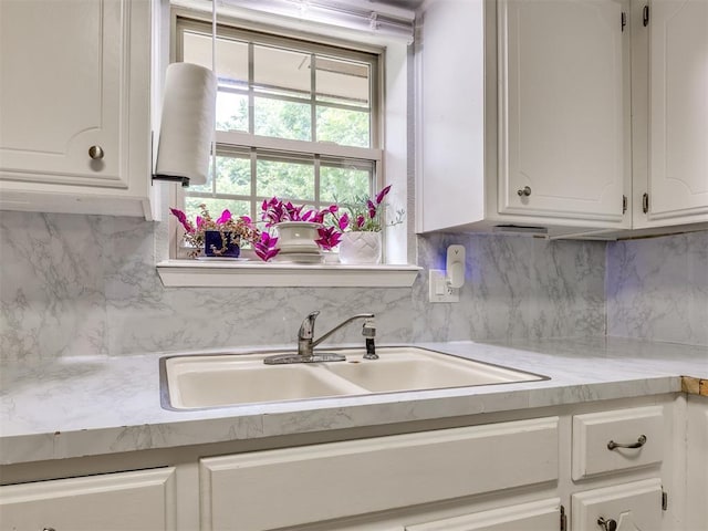 332 Crest Ln, Noble, OK 73068 - kitchen featuring white cabinetry, light countertops, and decorative backsplash