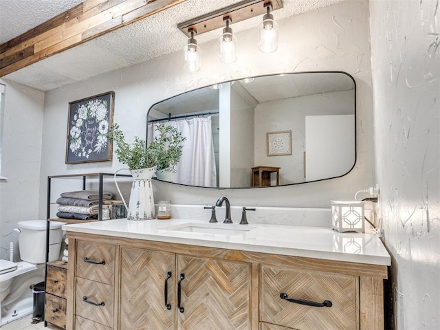 332 Crest Ln, Noble, OK 73068 - full bathroom featuring vanity, a textured wall, and a textured ceiling
