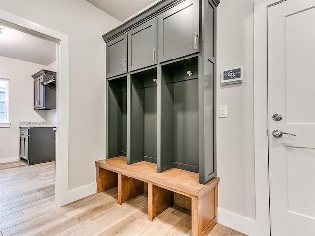 12825 Painted Sky, Edmond, OK 73007 - mudroom featuring light wood-style floors and baseboards