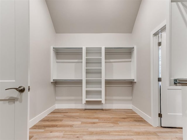 12825 Painted Sky, Edmond, OK 73007 - spacious closet featuring wood finished floors