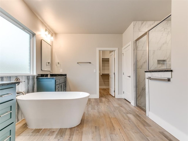 12825 Painted Sky, Edmond, OK 73007 - bathroom featuring vanity, a shower stall, and a freestanding bath