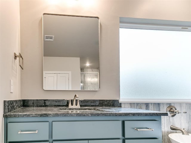 12825 Painted Sky, Edmond, OK 73007 - bathroom featuring vanity and a shower