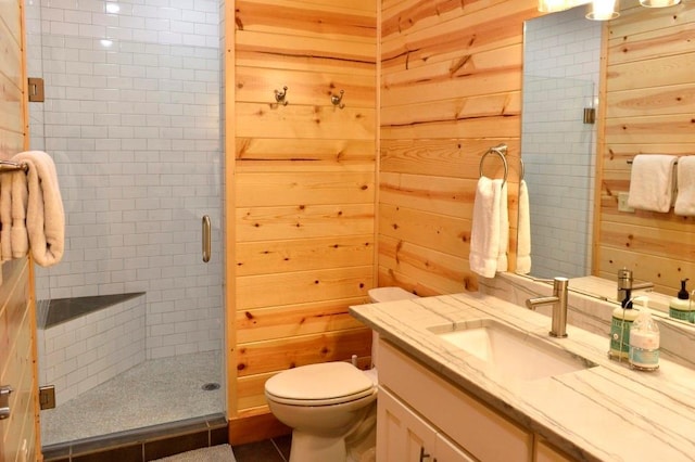 250 Almond Ln, Broken Bow, OK 74728 - bathroom featuring vanity, wood walls, a stall shower, and tile patterned floors