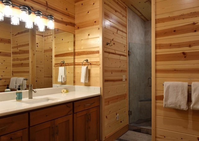 250 Almond Ln, Broken Bow, OK 74728 - bathroom featuring wooden walls, vanity, and a stall shower