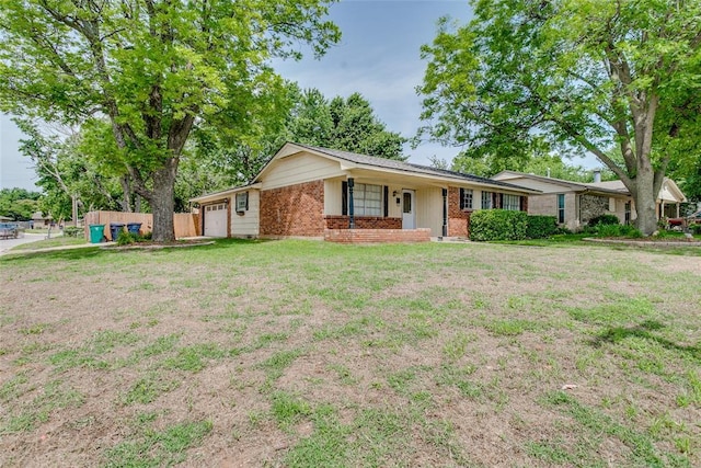 601 Woodland Way, Oklahoma City, OK 73127 - single story home with a garage and brick siding